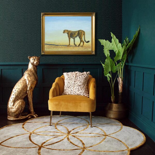 A dog sitting on the floor next to a chair.