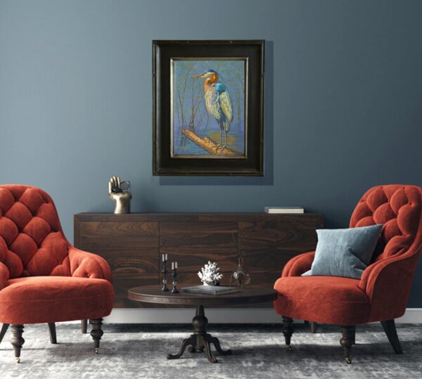 A painting of a bird on the wall above two chairs.