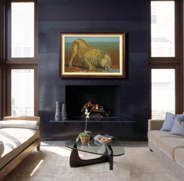 A living room with a fireplace and a painting on the wall