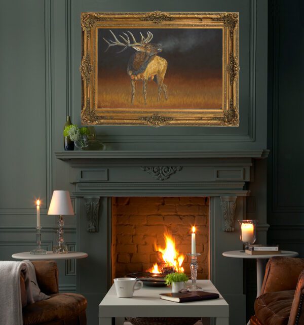 A fireplace with candles and two tables in front of it.