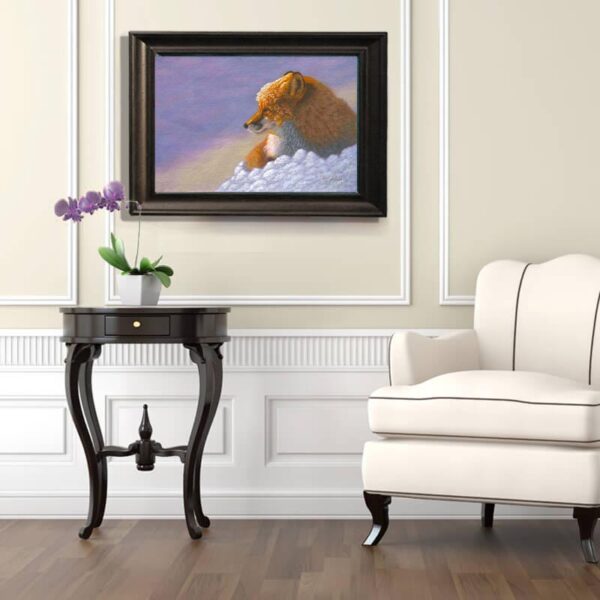 A white chair and table in front of a picture.